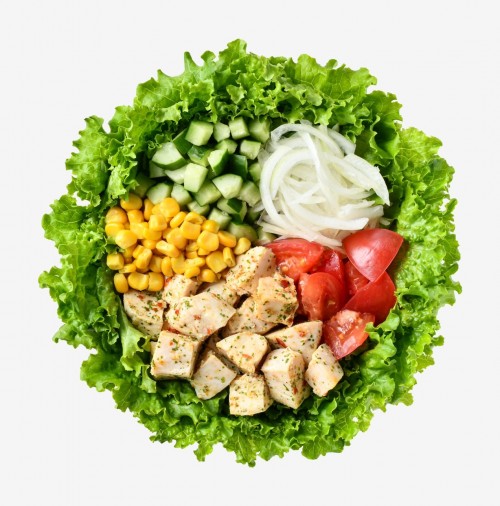 Salad of herb chicken and colorful vegetables